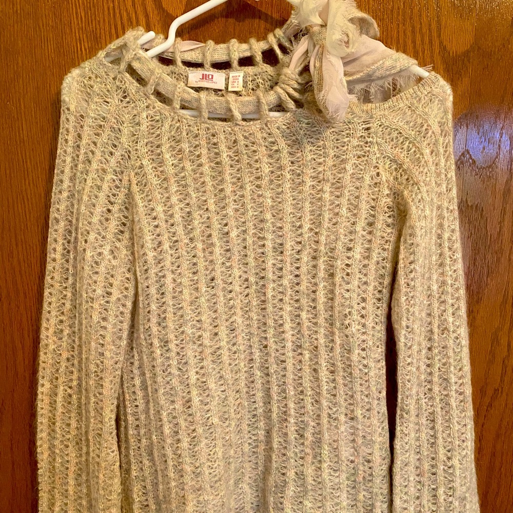 Asymmetrical cold-shoulder sweater w/feminine bow